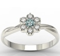 Ring i 14 karats guld med en topas på 0,08ct och 6 diamanter på 0,12ct