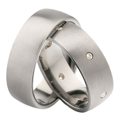 Vigselringar i titan och 18k gult guld med 6 diamanter 0,06ct