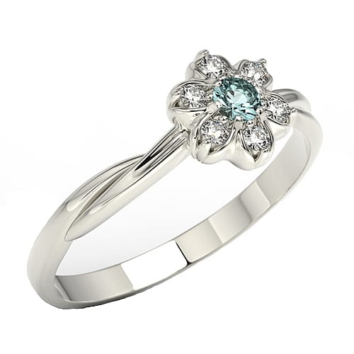 Ring i 14 karats guld med en topas på 0-08ct och 6 diamanter på 0-12ct