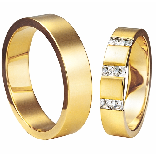 Vigselringar i 8k gult guld med 6 zirkonier Swarovski