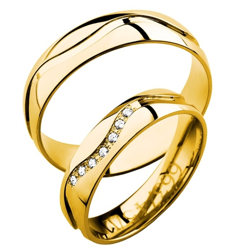 Vigselringar i 18k gult guld med 7 diamanter 0,07ct