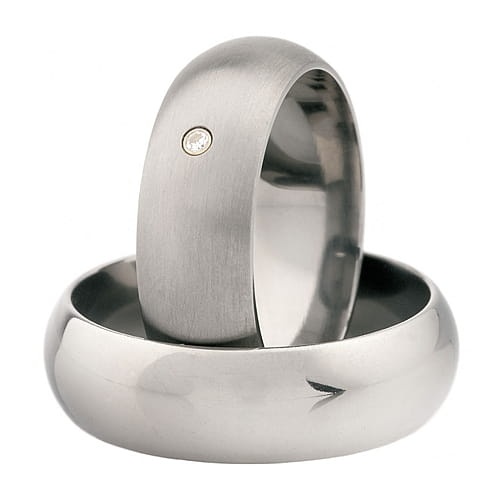 Vigselringar i titan och 18k gult guld med diamant 0,01ct