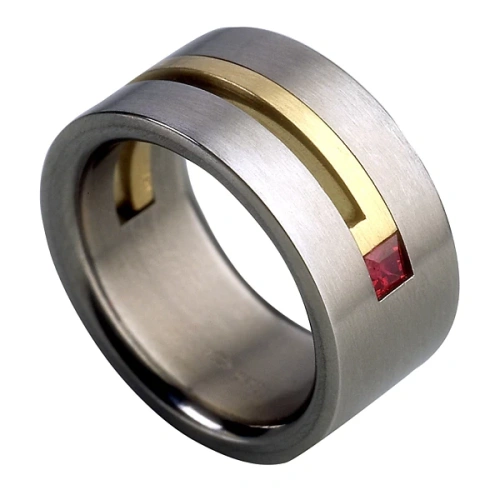 Vigselring i titan och gulguld med naturlig rubin 9 mm