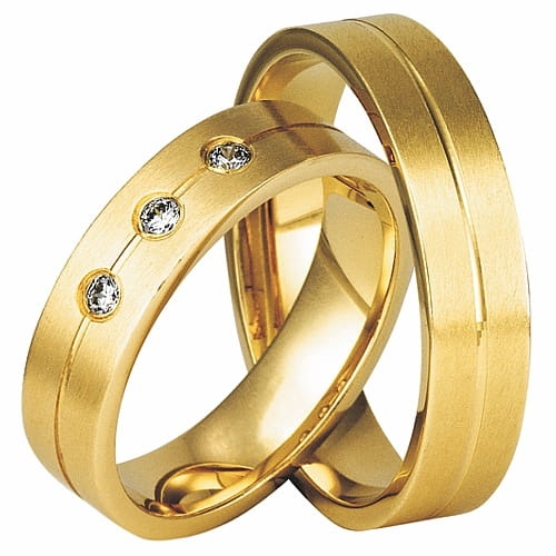 Vigselringar i 18k gult guld med 3 diamanter 0,06ct