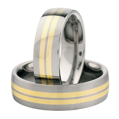 Vigselringar i titan och 18k gult guld