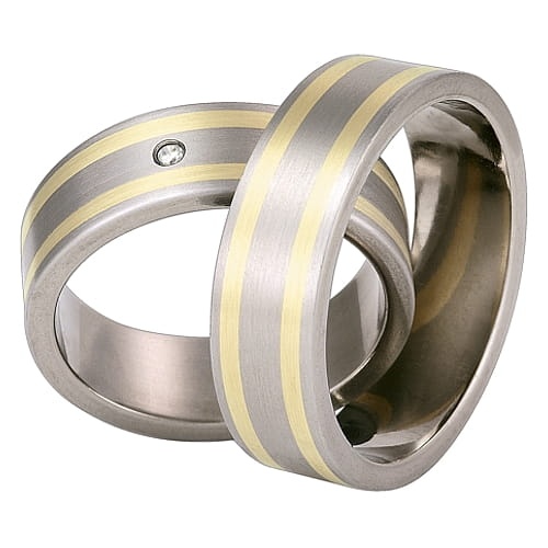 Vigselringar i titan och 18k gult guld med diamant 0,02ct