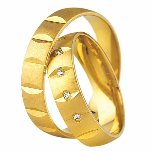 Vigselringar i 8k gult guld med 5 zirkonier Swarovski