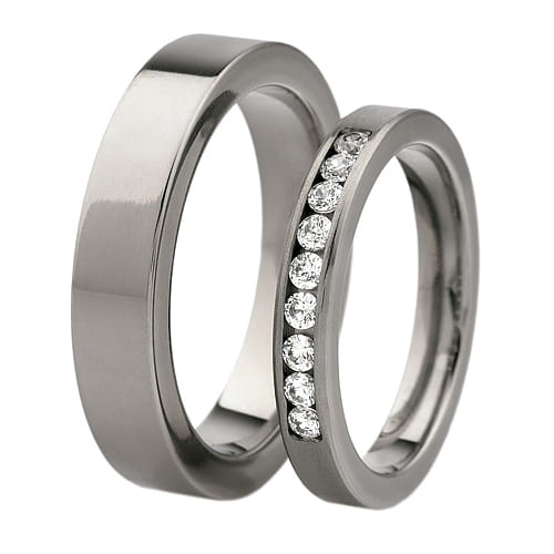 Vigselringar i titan med 9 diamanter 0-18ct