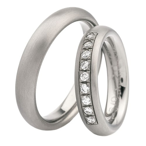 Vigselringar i titan med 9 diamanter 0-31ct