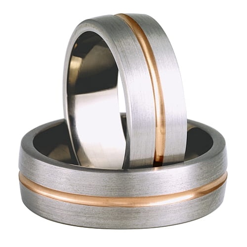 Vigselringar i titan och 14k rött guld