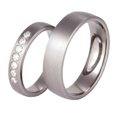Vigselringar i titan med 7 diamanter 0-14ct