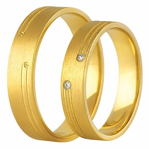 Vigselringar i 18k gult guld med 2 diamanter 0,02ct