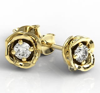 Örhängen i 14k gult guld med 2 diamanter 0,24ct