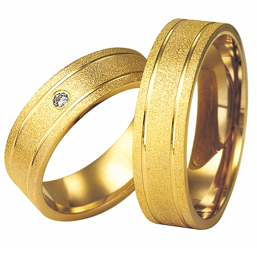 Vigselringar i 18k gult guld med diamant 0,03ct