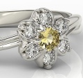 Ring i 14 karat guld med en citrin på 0,08 ct och 6 diamanter på 0,12 ct