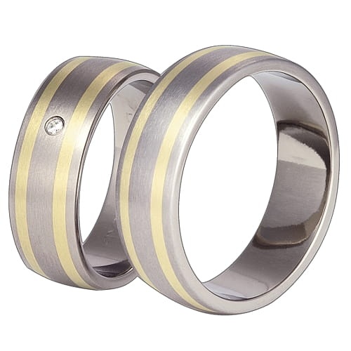 Vigselringar i titan och 18k gult guld med zirkonia Swarovski